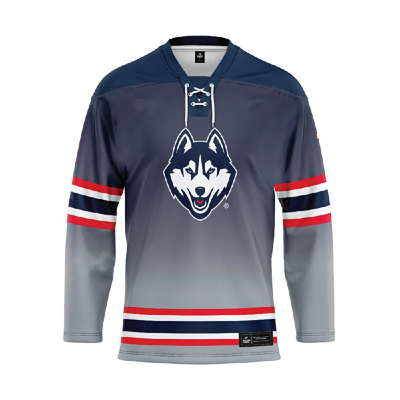 UConn - NCAA Women's Ice Hockey : Megan Warrener - Grey Hockey Jersey Pink Jersey Tee UConn - NCAA Women's Ice Hockey : Megan Warrener - Grey Hockey Jersey Pink Jersey Tee