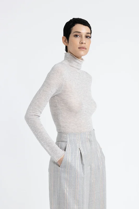 High neck sweater in angora wool with micro sequins Zippered Front Buttoned Front Snap Front