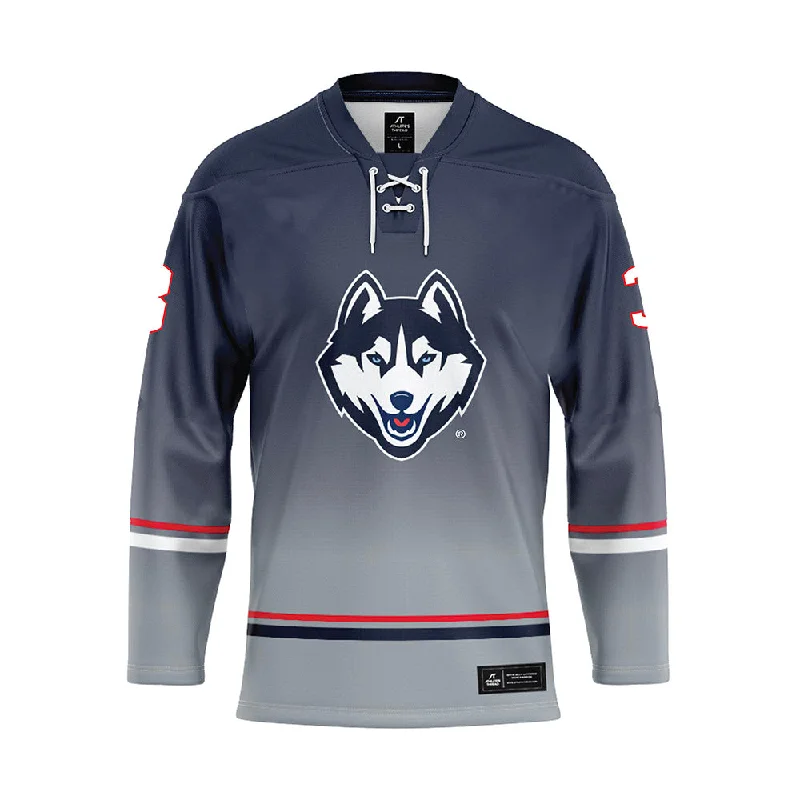 UConn - NCAA Women's Ice Hockey : Martha Mobarak - Grey Hockey Jersey Animal Print Jersey Tee UConn - NCAA Women's Ice Hockey : Martha Mobarak - Grey Hockey Jersey Animal Print Jersey Tee